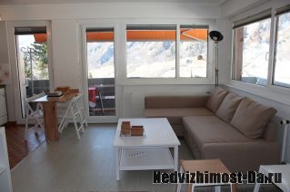 Квартира-студия в доме Flaminia на швейцарском курорте в Альпах