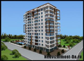 Продается квартира 1+1 в новом доме в центре Махмутлара в 400 метрах от моря.