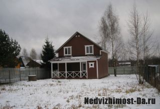 Современный зимний дом  из строганного бруса